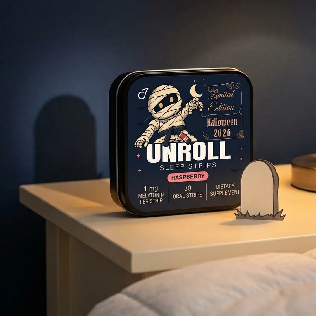 Halloween 2026 Unroll tin on a warmly lit bedside table